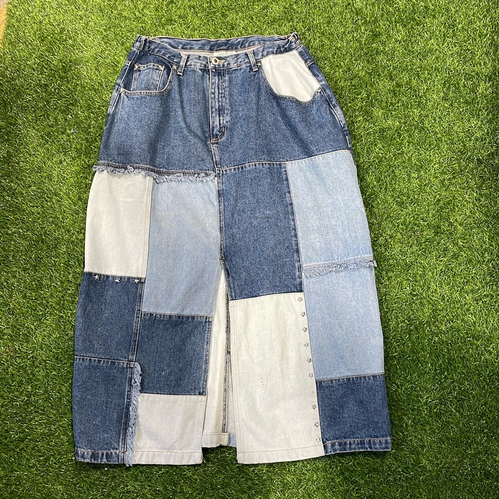 Ladies patchwork full length denim skirt with star studs detail.